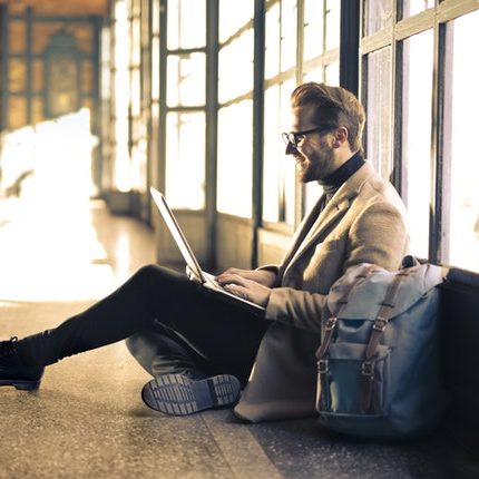 man working at train station