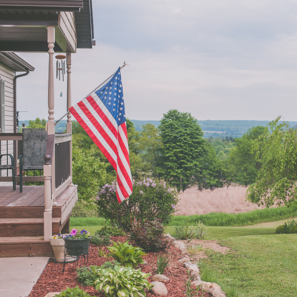 flag hanging from front porch