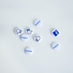A collection of buttons with facebook logos.